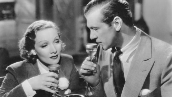 Afiche ilustrado de Marlene Dietrich y Gary Cooper.